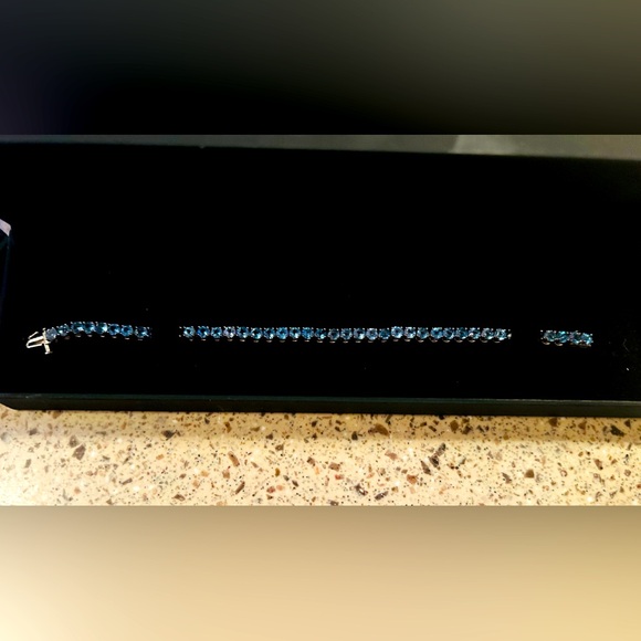 ZALES BLUE TOPAZ STERLING SILVER TENNIS BRACELET - Picture 1 of 6